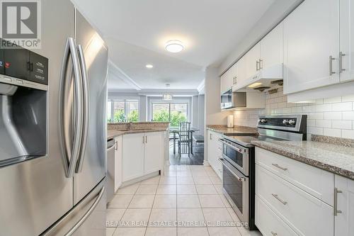 54 - 5662 Glen Erin Drive, Mississauga, ON - Indoor Photo Showing Kitchen With Upgraded Kitchen