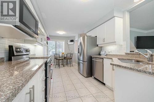 54 - 5662 Glen Erin Drive, Mississauga, ON - Indoor Photo Showing Kitchen With Double Sink