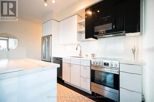 1509 - 33 Shore Breeze Drive, Toronto (Mimico), ON - Indoor Photo Showing Kitchen With Stainless Steel Kitchen With Upgraded Kitchen