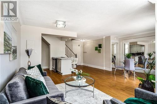 209 - 10 John Street, Hamilton (Dundas), ON - Indoor Photo Showing Living Room