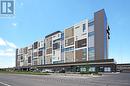 305 - 560 North Service Road, Grimsby, ON  - Outdoor With Facade 