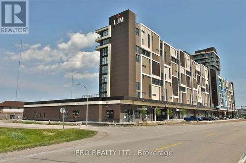 305 - 560 North Service Road, Grimsby, ON - Outdoor With Facade