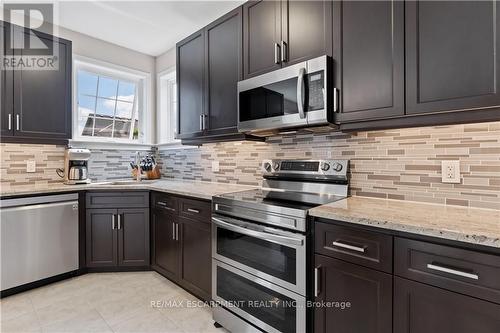 15 Efthemio Court, West Lincoln, ON - Indoor Photo Showing Kitchen With Stainless Steel Kitchen With Upgraded Kitchen