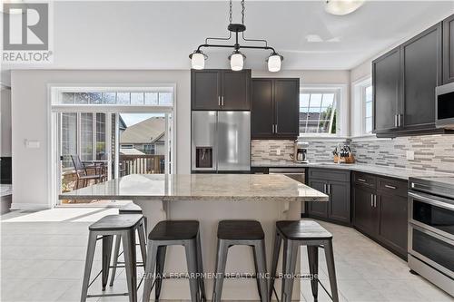 15 Efthemio Court, West Lincoln, ON - Indoor Photo Showing Kitchen With Stainless Steel Kitchen With Upgraded Kitchen