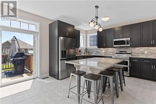 15 Efthemio Court, West Lincoln, ON - Indoor Photo Showing Kitchen With Stainless Steel Kitchen With Upgraded Kitchen