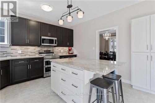 15 Efthemio Court, West Lincoln, ON - Indoor Photo Showing Kitchen With Upgraded Kitchen