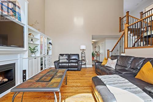 51 Sturgess Crescent, Whitby, ON - Indoor Photo Showing Living Room With Fireplace