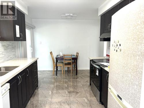 Main Fl - 100 Crockamhill Drive, Toronto, ON - Indoor Photo Showing Kitchen With Double Sink