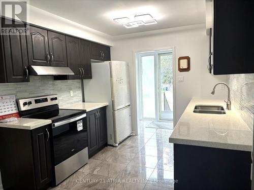 Main Fl - 100 Crockamhill Drive, Toronto, ON - Indoor Photo Showing Kitchen With Double Sink