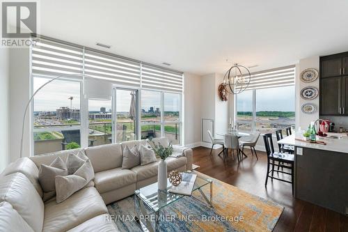 710 - 2480 Prince Michael Drive, Oakville, ON - Indoor Photo Showing Living Room