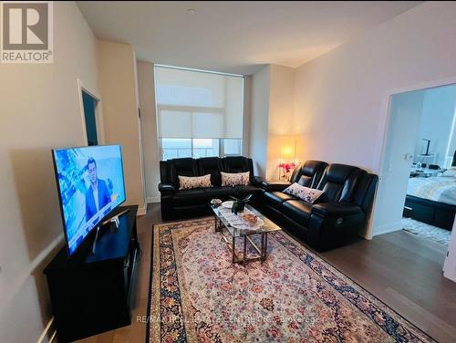 1 - 4055 Parkside Village Drive, Mississauga, ON - Indoor Photo Showing Living Room