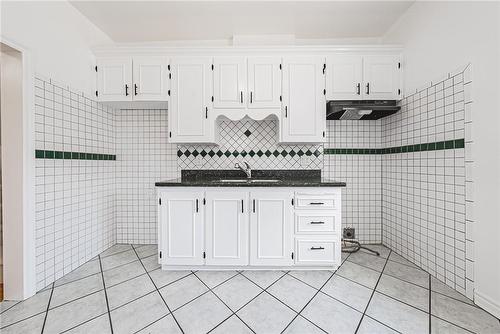 28 Fullerton Avenue, Hamilton, ON - Indoor Photo Showing Kitchen With Double Sink