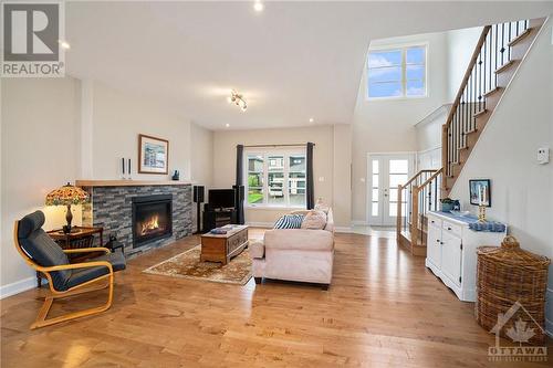 60 Duncanville Street, Russell, ON - Indoor Photo Showing Living Room With Fireplace