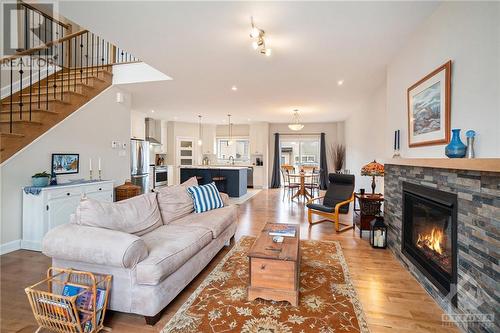 60 Duncanville Street, Russell, ON - Indoor Photo Showing Living Room With Fireplace