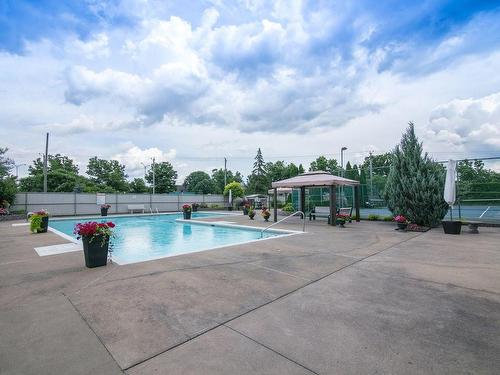 Vue d'ensemble - 606-8065 Boul. St-Laurent, Brossard, QC - Outdoor With In Ground Pool