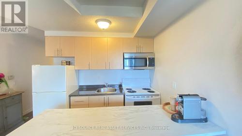 703 - 15 Maplewood Avenue, Toronto, ON - Indoor Photo Showing Kitchen With Double Sink