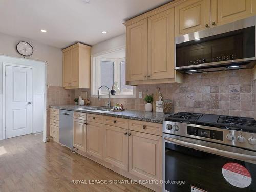 28 Tanjoe Cres, Toronto, ON - Indoor Photo Showing Kitchen With Double Sink