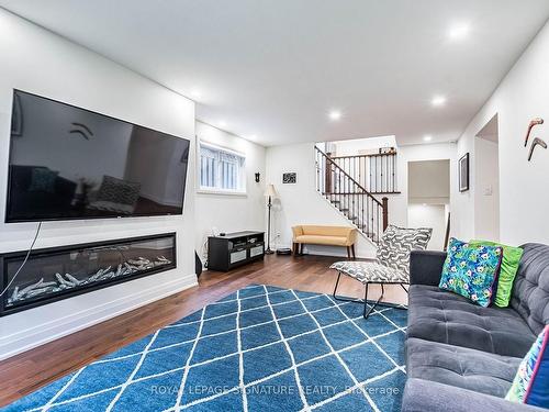 2667 Council Ring Rd, Mississauga, ON - Indoor Photo Showing Living Room With Fireplace