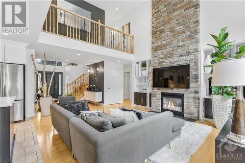 287 Charbonneau Street, Rockland, ON - Indoor Photo Showing Living Room With Fireplace