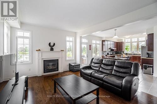 1 Treetops Boulevard, New Tecumseth, ON - Indoor Photo Showing Living Room With Fireplace