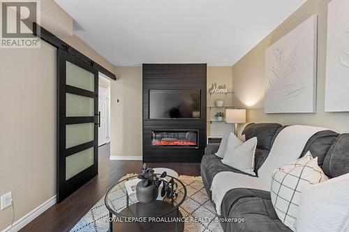 5 Teddington Crescent, Whitby, ON - Indoor Photo Showing Living Room With Fireplace