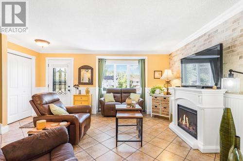 627 Spence Avenue Unit#205, Hawkesbury, ON - Indoor Photo Showing Living Room With Fireplace