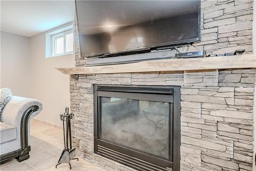 134 Stirling Street, Caledonia, ON - Indoor Photo Showing Living Room With Fireplace