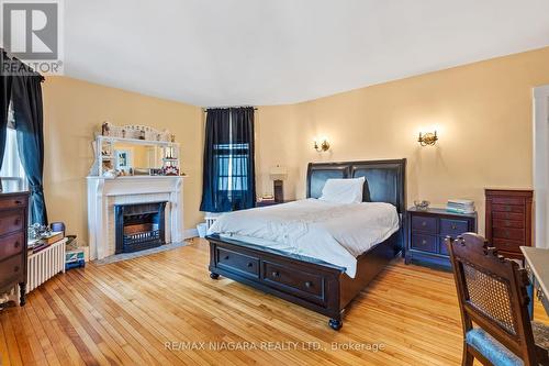 14 Catharine Street, Port Colborne, ON - Indoor Photo Showing Bedroom With Fireplace