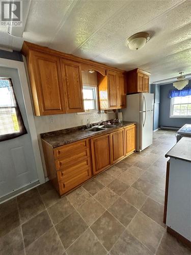 11 Bragg'S Lane, Port Aux Basques, NL - Indoor Photo Showing Kitchen With Double Sink