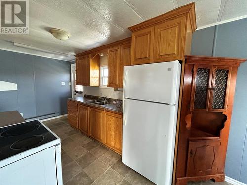 11 Bragg'S Lane, Port Aux Basques, NL - Indoor Photo Showing Kitchen With Double Sink