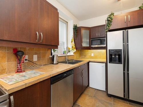 Kitchen - 8-4885 Ch. Queen-Mary, Montréal (Côte-Des-Neiges/Notre-Dame-De-Grâce), QC - Indoor Photo Showing Kitchen With Double Sink