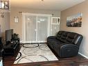 #310E 1300 Stockton Street N, Regina, SK  - Indoor Photo Showing Living Room 