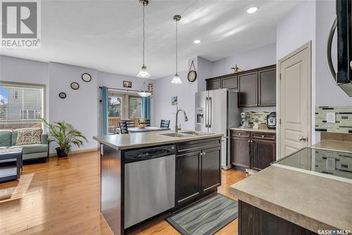 118 Mcbeth Crescent, Saskatoon, SK - Indoor Photo Showing Kitchen With Stainless Steel Kitchen With Upgraded Kitchen