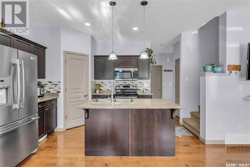 118 Mcbeth Crescent, Saskatoon, SK - Indoor Photo Showing Kitchen With Stainless Steel Kitchen With Upgraded Kitchen