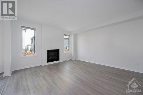 1056 Kilbirnie Drive, Ottawa, ON - Indoor Photo Showing Living Room With Fireplace