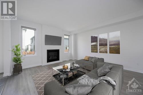 1056 Kilbirnie Drive, Ottawa, ON - Indoor Photo Showing Living Room With Fireplace