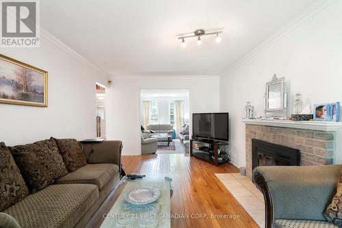 126 St Bees Court, London, ON - Indoor Photo Showing Living Room With Fireplace