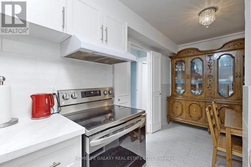 304 - 25 Silver Springs Boulevard, Toronto, ON - Indoor Photo Showing Kitchen