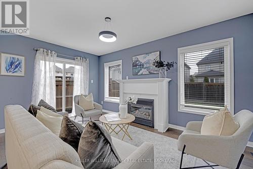 82 Sidney Rundle Avenue, Clarington, ON - Indoor Photo Showing Living Room With Fireplace