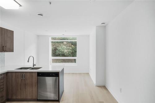 467 Charlton Avenue E|Unit #202, Hamilton, ON - Indoor Photo Showing Kitchen With Double Sink