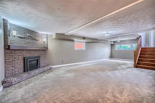 15 Kingsberry Street, Hamilton, ON - Indoor Photo Showing Basement With Fireplace