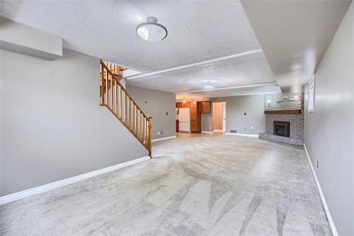 15 Kingsberry Street, Hamilton, ON - Indoor Photo Showing Other Room With Fireplace