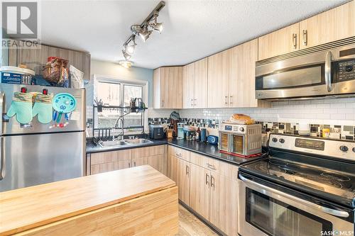 6 4Th Ave Court, Allan, SK - Indoor Photo Showing Kitchen With Stainless Steel Kitchen With Double Sink