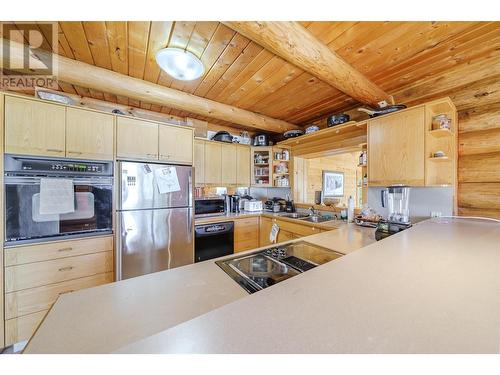 7383 Johnstone Road, Bridge Lake, BC - Indoor Photo Showing Kitchen With Double Sink