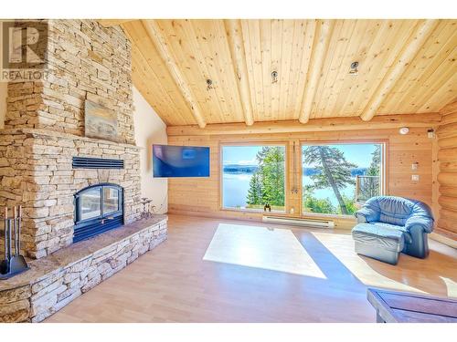 7383 Johnstone Road, Bridge Lake, BC - Indoor Photo Showing Living Room With Fireplace