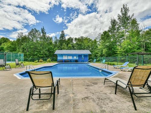Piscine - 5-15 Rue Félix-Leclerc, Sainte-Agathe-Des-Monts, QC - Outdoor With In Ground Pool With Backyard