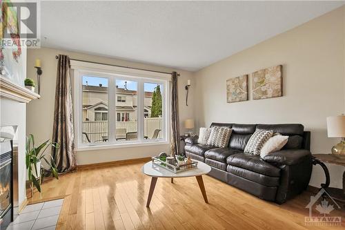 2103 Gardenway Drive, Ottawa, ON - Indoor Photo Showing Living Room With Fireplace