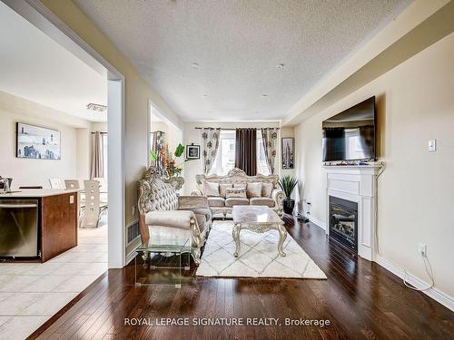 15 Yardmaster Dr, Brampton, ON - Indoor Photo Showing Living Room With Fireplace