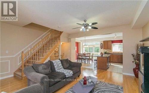 18 Curran Hall Crescent, Toronto, ON - Indoor Photo Showing Living Room With Fireplace