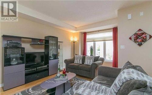 18 Curran Hall Crescent, Toronto, ON - Indoor Photo Showing Living Room